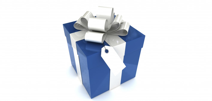 a blue gift box with a white ribbon