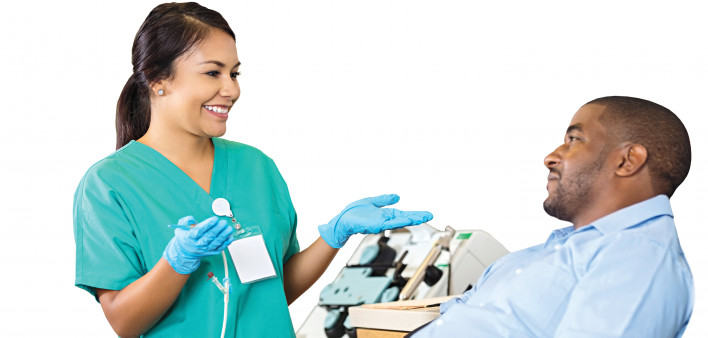 nurse and patient in hospital receiving treatment