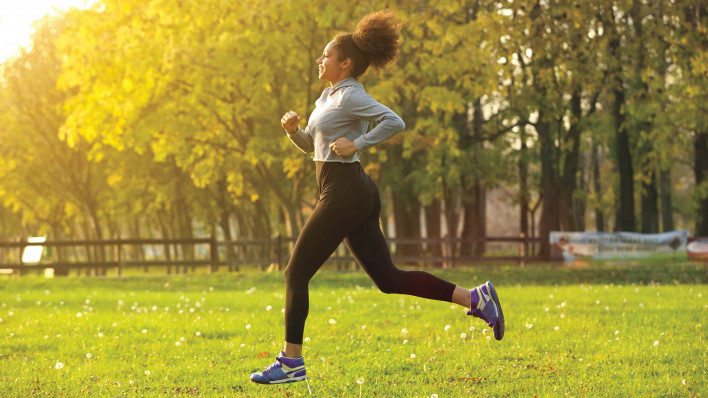 young woman running outdoors