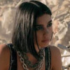 Dua Lipa in the video to “Swan Song”