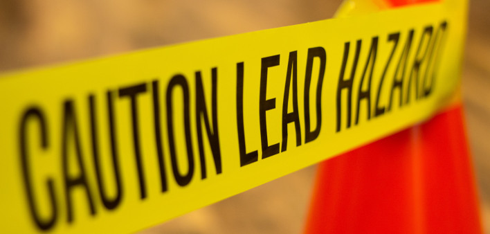 yellow caution tape lead hazard warning