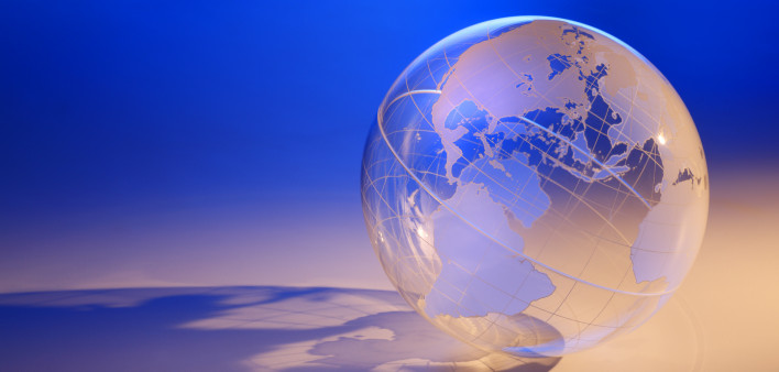 a transparent globe casting a shadow