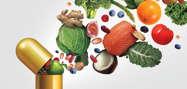healthy food pouring into gold capsule illustration fruite vegetables salmon nuts coconut kale