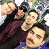 (Left to right): Kevin Jonas Sr. with his sons Nick, Kevin and Joe.