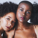 Three young black girls in a group
