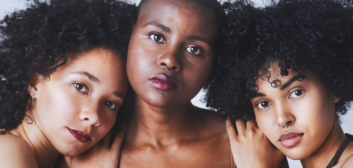 Three young black girls in a group
