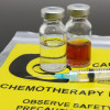 A syringe and two vials of chemotherapy drugs