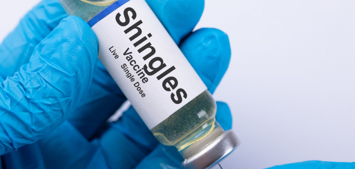 Close-up Of A Doctor's Hand Filling Shingles Vaccine Syringe