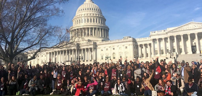 AIDSWatch participants rally outside the U.S. Capitol before lobbying members of Congress.