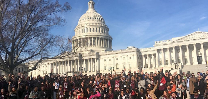 AIDSWatch participants rally outside the U.S. Capitol before lobbying members of Congress.