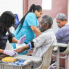 Men give blood at recent Fans for Cure event in Brooklyn, New York.