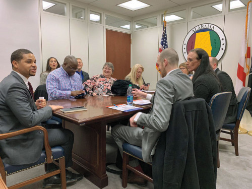 HIV activists meet with the staff of Alabama Senator Doug Jones.