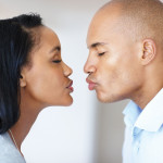 black couple kissing