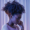 depressed black girl in bedroom