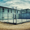 prison yard barbed wire fence