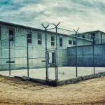prison yard barbed wire fence
