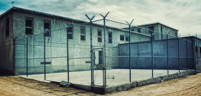 prison yard barbed wire fence