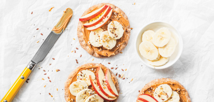 Real Health Summer 2019 peanut butter, crackers apples, bananas, sesame seeds