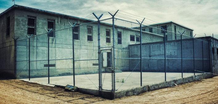 prison yard barbed wire fence