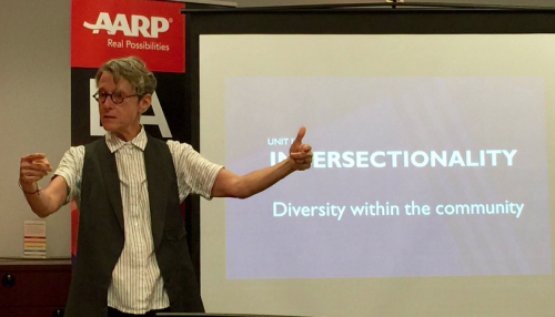 An educator gestures at one of the organization's cultural competency training sessions