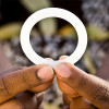 A woman holds the dapivirine vaginal ring