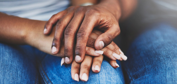 african american couple holding hands