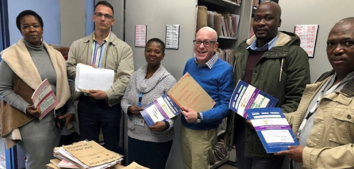 Ben Sway (center), a Peace Corps Response volunteer in South Africa