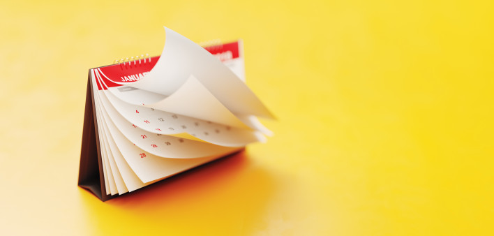 red calendar on yellow background