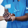 doctor holding a hand