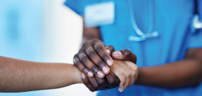 doctor holding a hand