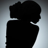 silhouette of woman from behind