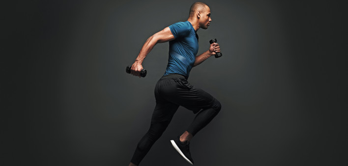 man running with weights