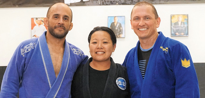 Avie Barron with her husband, Tim (right) and her coach, Orlando