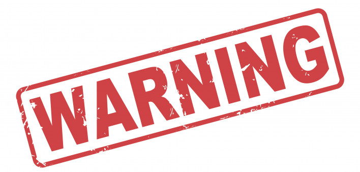 Stamp warning with red text on white
