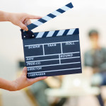 clapper with tv camera video camera