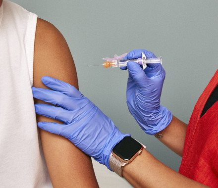 a vaccine is injected into arm