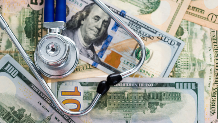Stethoscope on us paper currency
