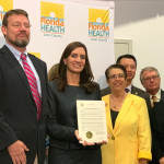 Florida Lieutenant Governor Jeanette M. Nunez with a proclamation for National Latinx AIDS Awareness Day