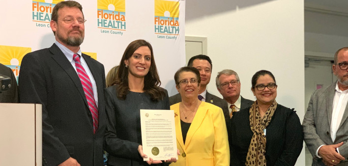 Florida Lieutenant Governor Jeanette M. Nunez with a proclamation for National Latinx AIDS Awareness Day