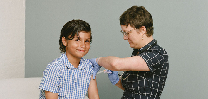 boy receives a vaccine