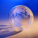 a transparent globe casting a shadow