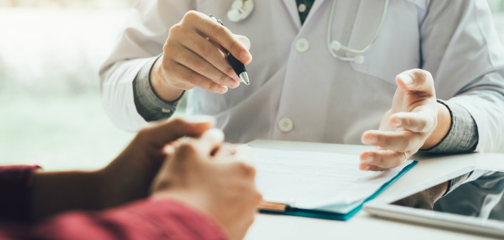 Doctor talking to the patient about menopause and treatment in future.