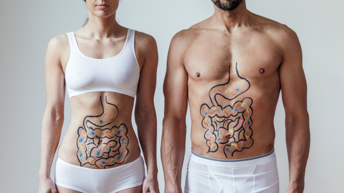 microbiome woman man intestines drawn on stomachs