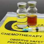 A syringe and two vials of chemotherapy drugs