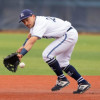 Caleb Kerbs of the University of Maine makes a backhand stab of a ground ball during a recent game at Mahaney Diamond in Orono.