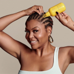 Taraji P. Henson uses a product from her new hair care line.