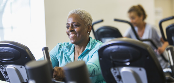 older woman on exercise bike