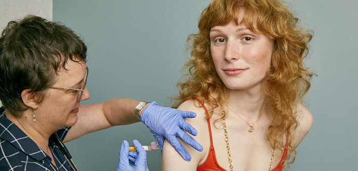 girl receiving a vaccine