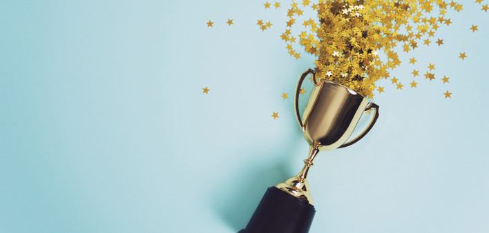 trophy with stars coming out