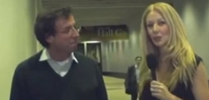 POZ editor-in-chief Regan Hofmann talks with Bernard Hirschel, MD, of the University Hospital, Geneva, Switzerland